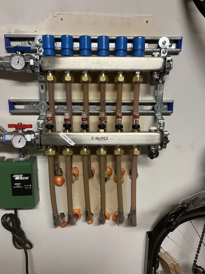 Plumber performing Gas Line Installation at a residential property in Heathrow